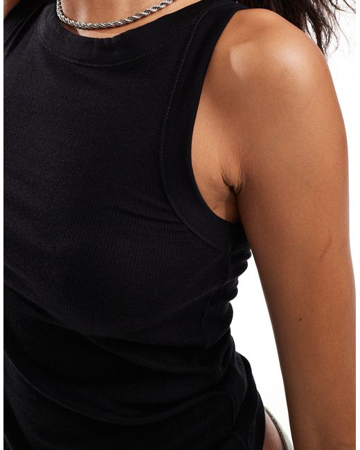 Camiseta negra sin mangas rina AllSaints de color Black