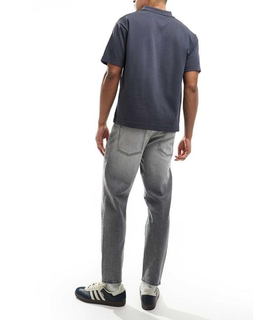Vaqueros Lavado De Corte Tapered De ASOS de hombre de color Blue
