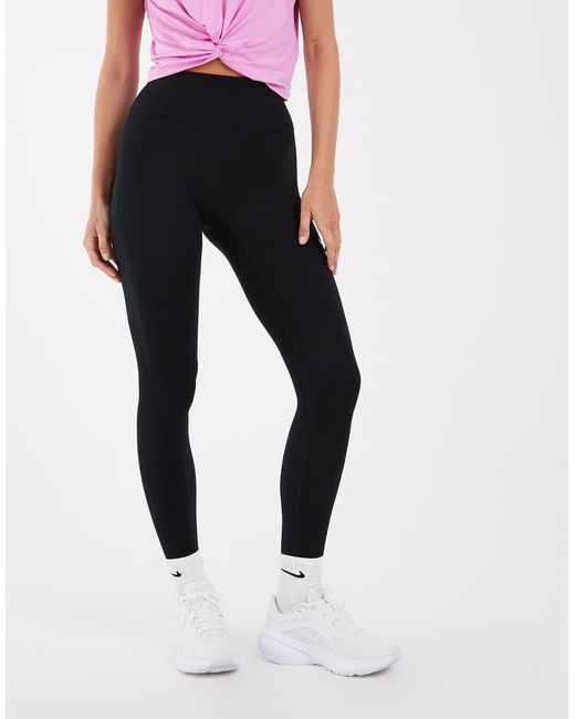 Leggings Con Estribo En Nike de color Pink