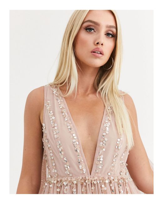asos design mini dress with heavily embellished cape Asos Design High Neck Drape Front Extreme Cape Sleeve Mini Dress in Blue  Floral