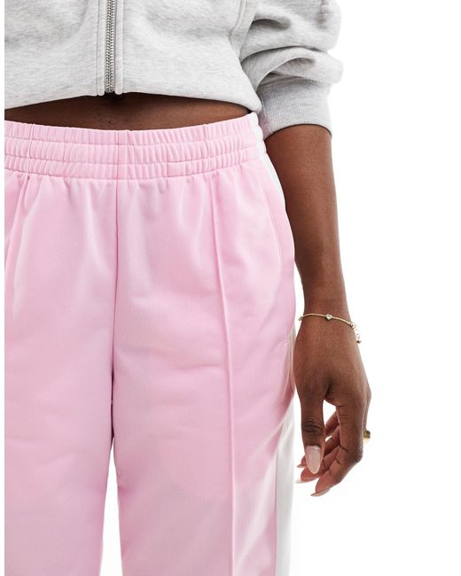 Adibreak - pantaloni pastello con bottoni a pressione di Adidas Originals in Pink