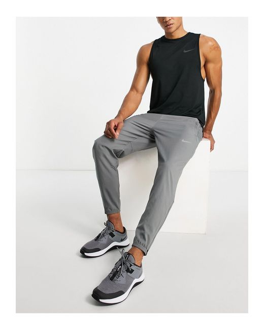 nike dri fit challenger pants