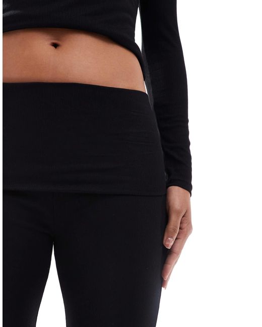 Pantalon double épaisseur évasé en jersey côtelé à taille rabattue South Beach en coloris Black