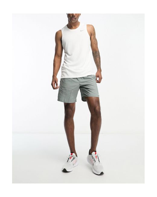 Camiseta blanca sin mangas dri-fit miler Nike de hombre de color White