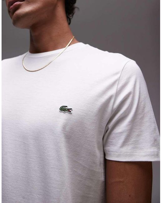 Pima di Lacoste in Brown da Uomo