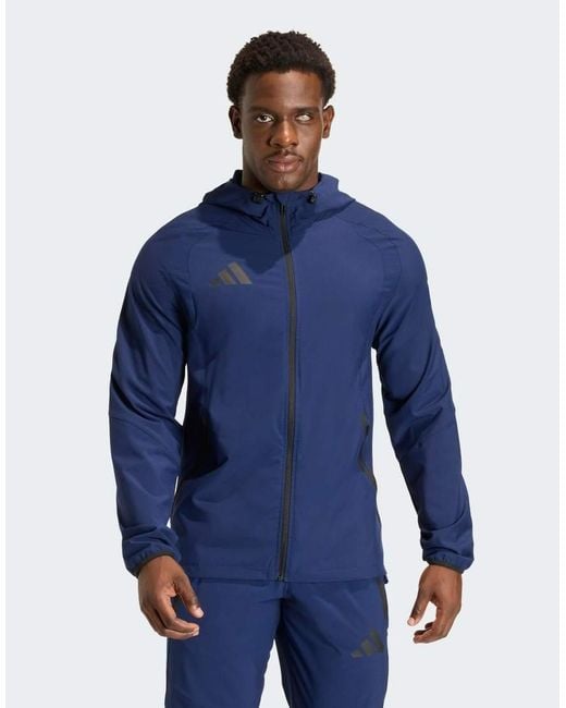 Adidas Originals Blue Tiro Travel Windbreaker Jacket for men