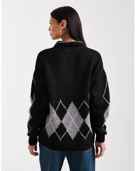 Pull en maille à losanges et col polo Tommy Hilfiger en coloris Black
