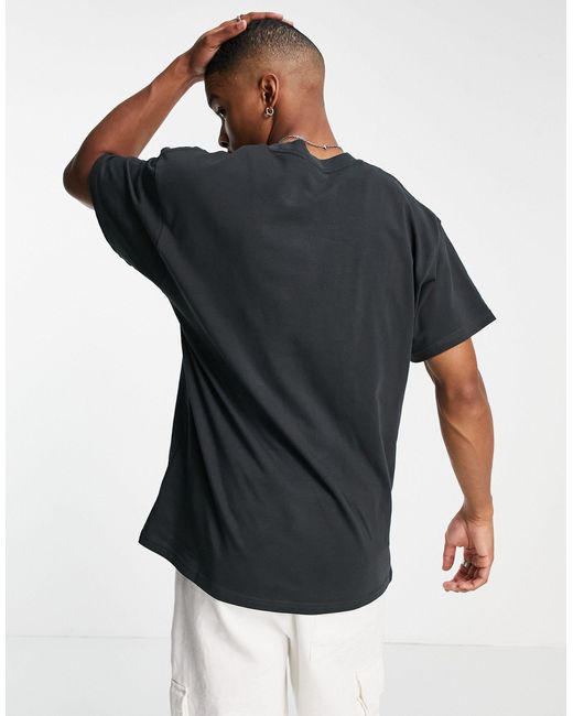 Camiseta extragrande con diseño retro, lavado negro y logo Nike de hombre  de color Negro | Lyst