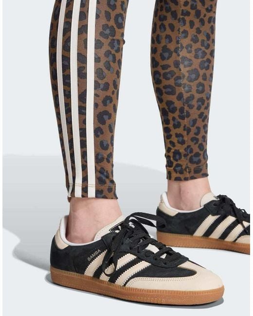 Leggings Multicolores Con Estampado De Leopardo Y Detalle De 3 Rayas De Adidas Originals de color Black