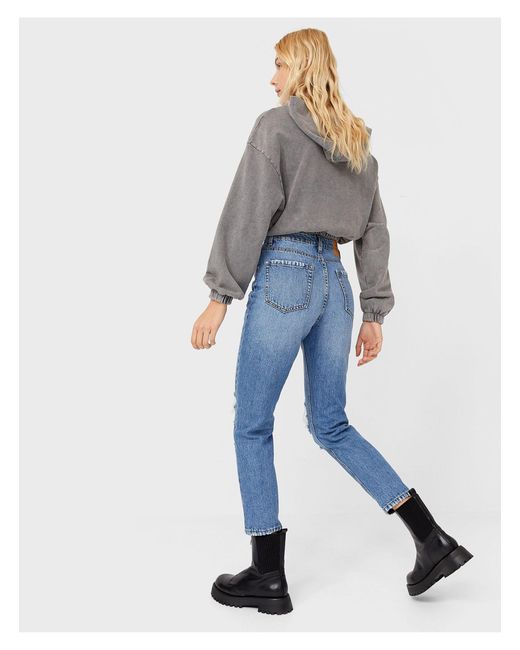 Mom jeans vintage strappati di Stradivarius in Blu | Lyst