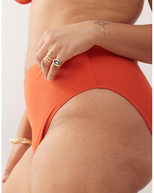 Curve - bas Collusion en coloris Orange