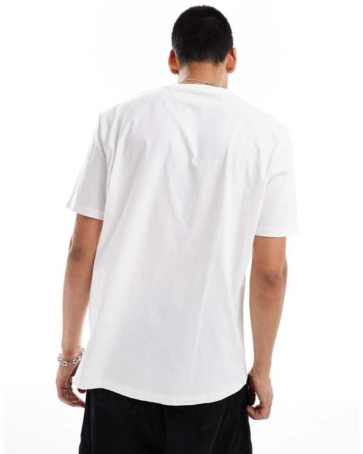 T-Shirt Bianca Con Logo Piccolo Al Centro di Timberland in White da Uomo
