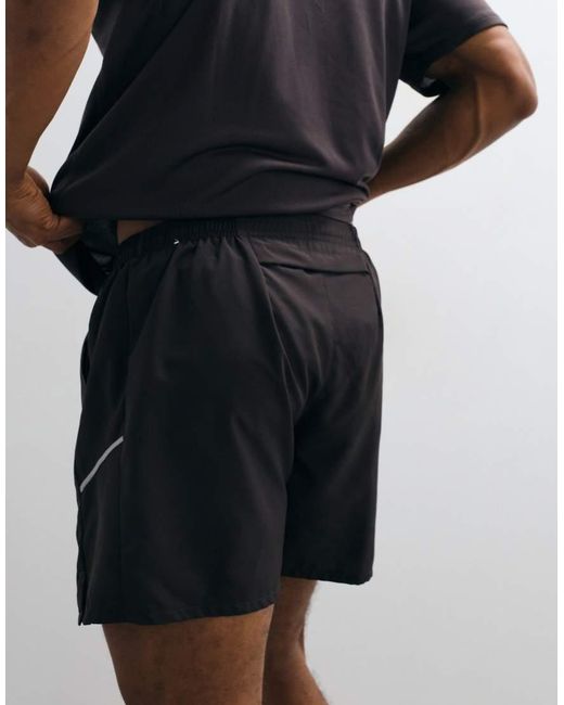 Nike Black Miler Dri-Fit 5 Inch Shorts for men