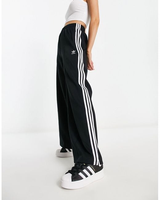 Buy adidas Originals Black Relaxed Joggers from Next Luxembourg