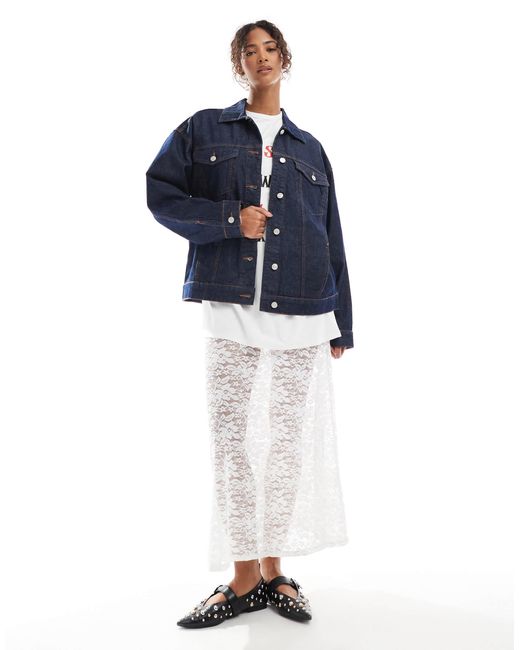 Veste oversize en jean style années 90 - délavage brut ASOS en coloris Blue