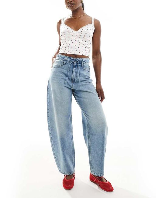 Jeans A Cilindro Lavaggio Medio Allacciati Davanti di Bershka in Blue