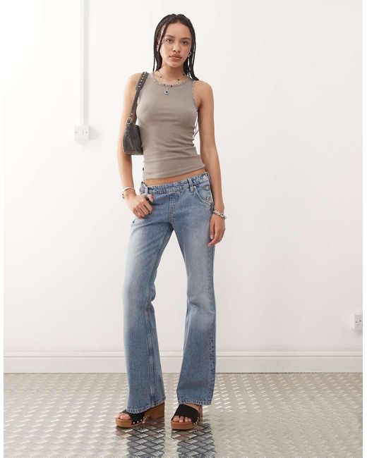 Weekday Blue Low Waist Flare Jeans With Side Button Western Detail