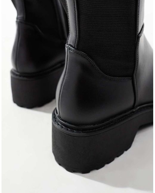 Botas Por La Rodilla Negras De Estilo Ecuestre Con Suela Gruesa Callback De Steve Madden de color Black