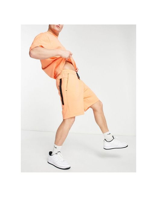 Shorts naranja empolvado tech fleece Nike de hombre de color Naranja | Lyst
