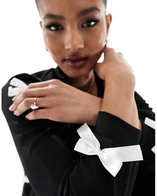 Fashionkilla Black Ribbed Zip Through Contrast Bow Detail Jumper