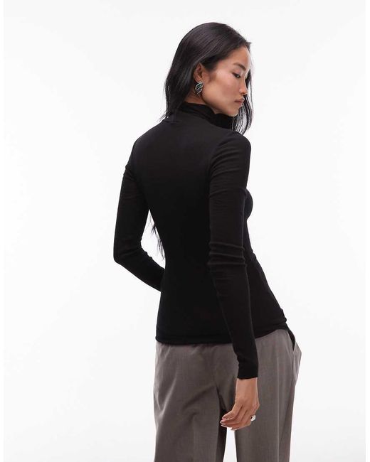 ARKET Gebreide Halfdoorschijnende Top Van Merinowol Met Lange Mouwen En Col in het Black