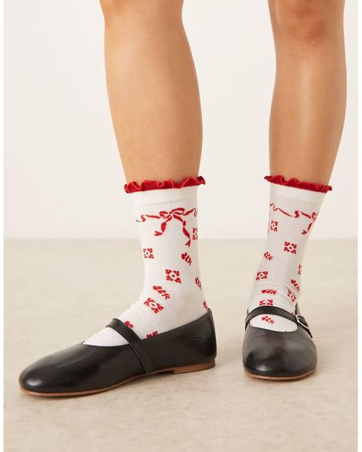 Accessorize Sokken Met Rode Strikjes in het Natural