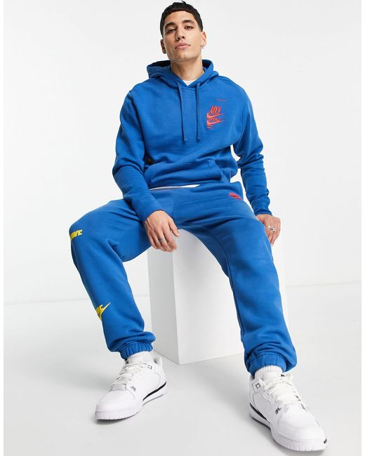 Nike Sport Essentials Multi Futura Logo Fleece joggers in Blue for Men |  Lyst Australia