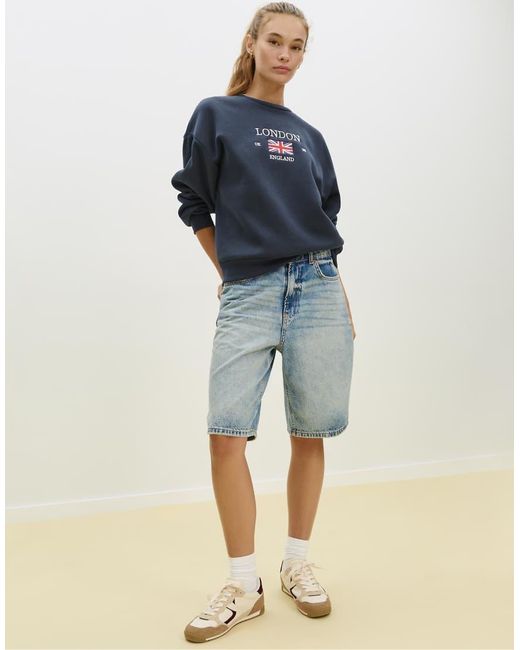 Felpa Color Blu Scuro Con Ricamo "London" di Stradivarius in Blue