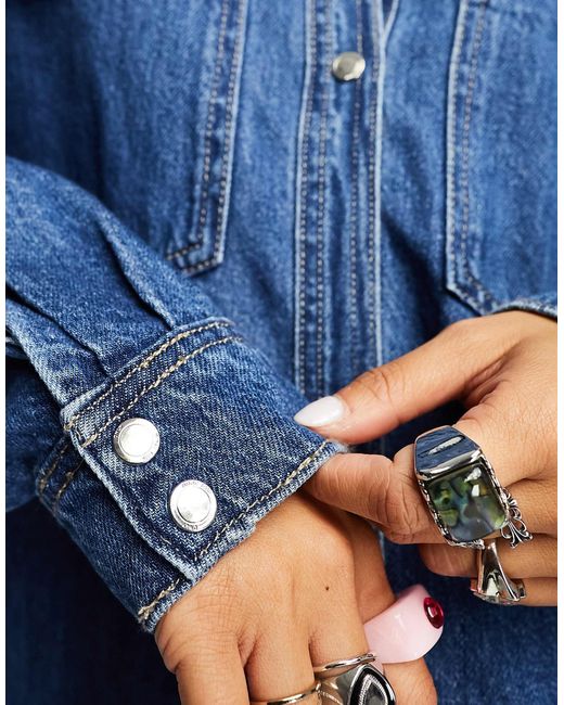 Robe chemise courte et oversize en jean - moyen ONLY en coloris Blue