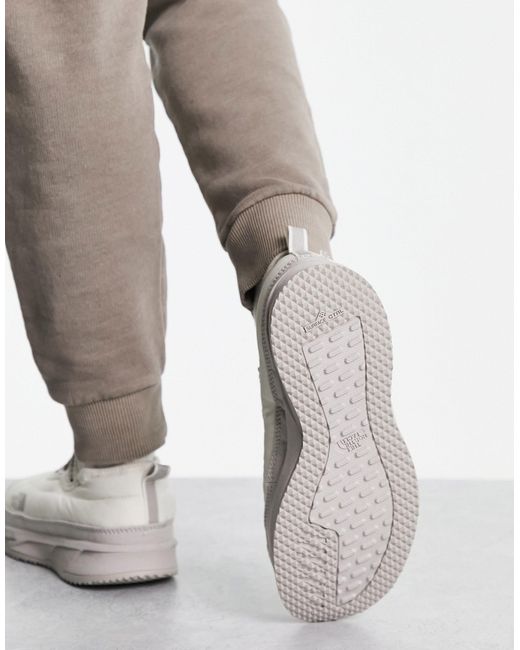 Nse - scarpe con isolamento termico color crema di The North Face in White