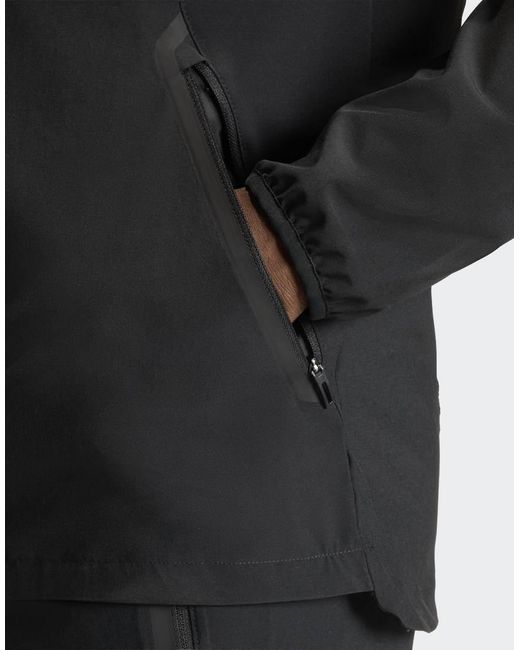 Adidas Originals Black Tiro Travel Windbreaker Jacket for men