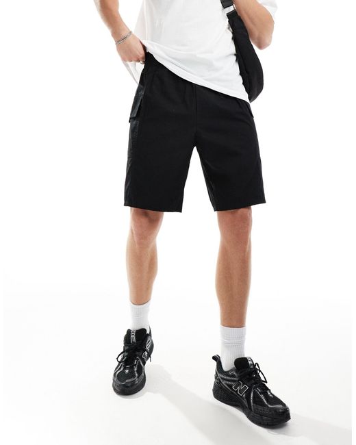The North Face Black Logo Pocket Shorts for men
