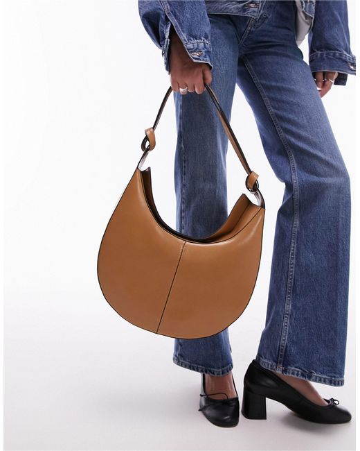 Stella - borsa da spalla arrotondata color cuoio con nodi di TOPSHOP in Blue