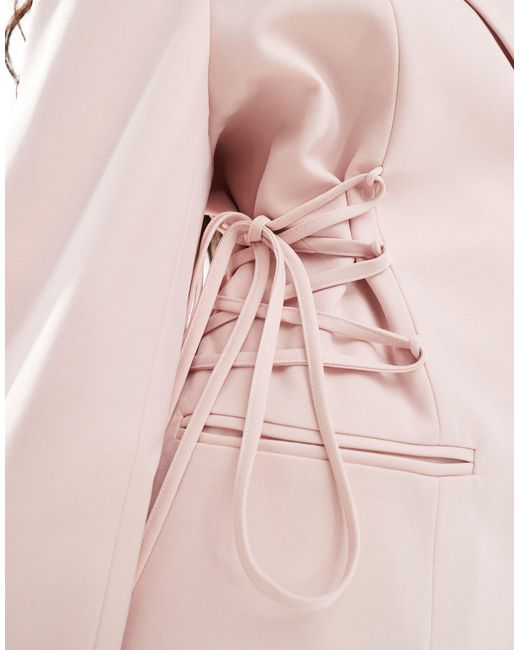 Esclusiva - vestito corto stile blazer con laccetti laterali stile corsetto chiaro di Aria Cove in Pink