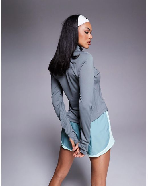 Tempo - t-shirt à col zippé et manches longues en tissu dri-fit Nike en coloris Blue