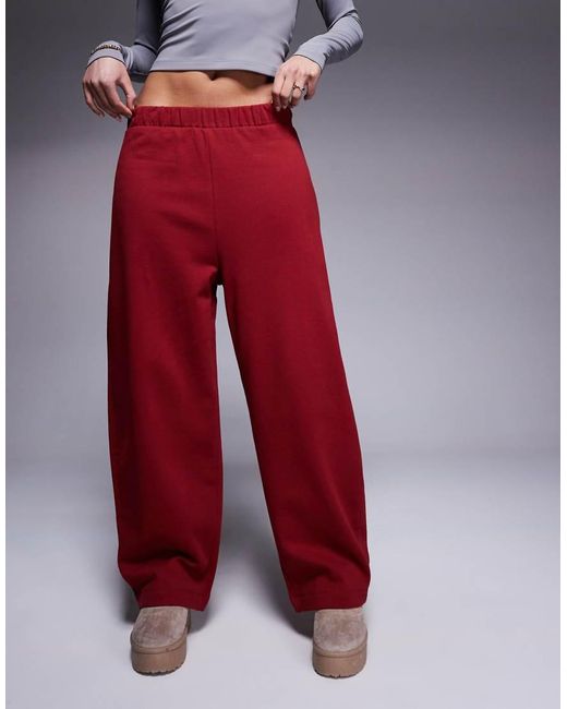 ASOS Joggingbroek Met Ronde Pijpen in het Red