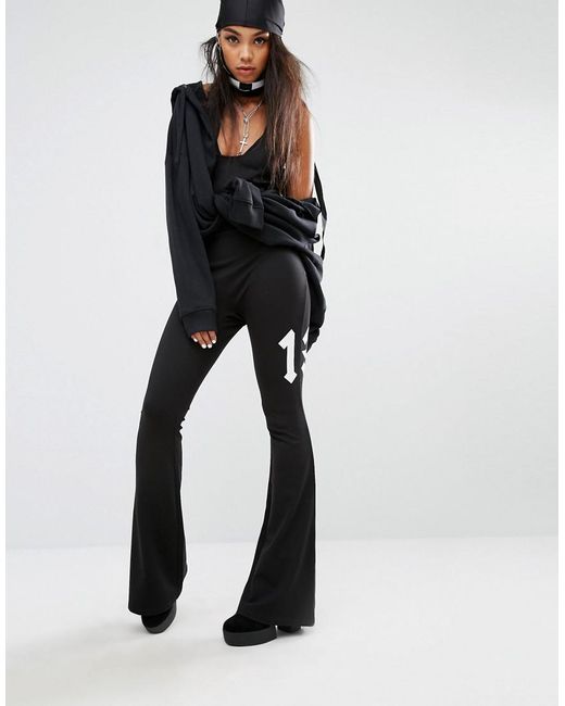 PUMA Synthetic Fenty X By Rihanna Flared Jumpsuit in Black | Lyst Canada