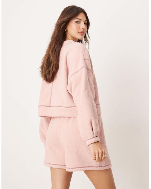 Ensemble sweat et short confort en micropolaire avec détails contrastants ASOS en coloris Pink