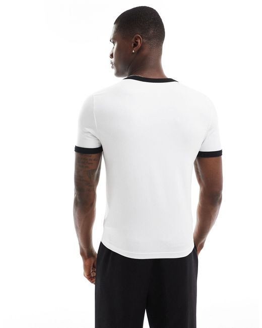 Camiseta blanca ajustada con ribetes y estampado "monaco" ASOS de hombre de color White