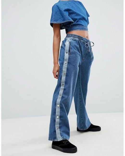 Pantalon de survêtement en jean avec boutons-pression sur le côté