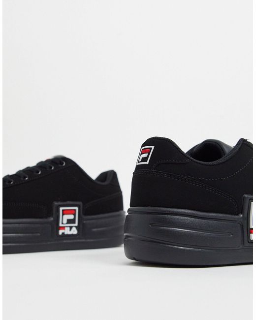 black fila platform trainers