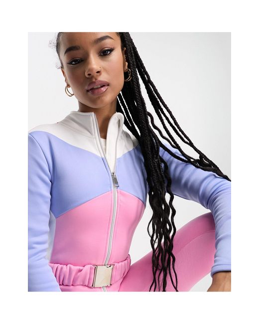 Petite - tuta jumpsuit da sci pastello con cintura di Threadbare in Pink
