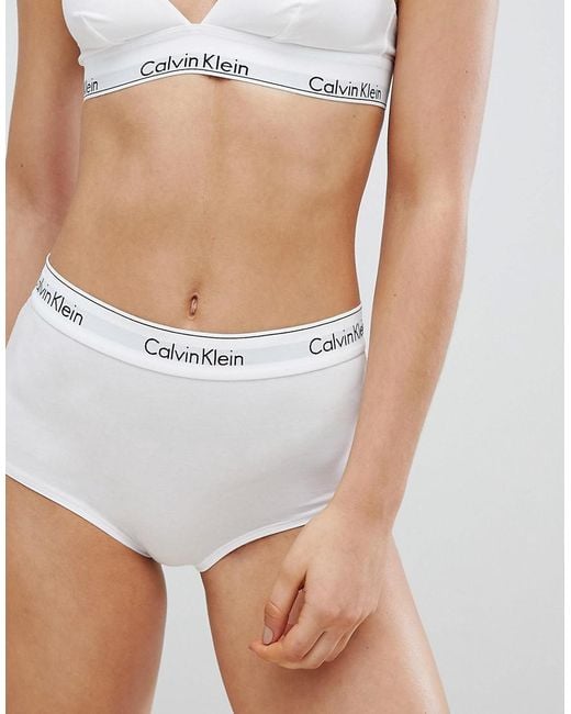 https://cdna.lystit.com/520/650/n/photos/asos/84c238f2/calvin-klein-white-Modern-Cotton-High-Waist-Brief.jpeg