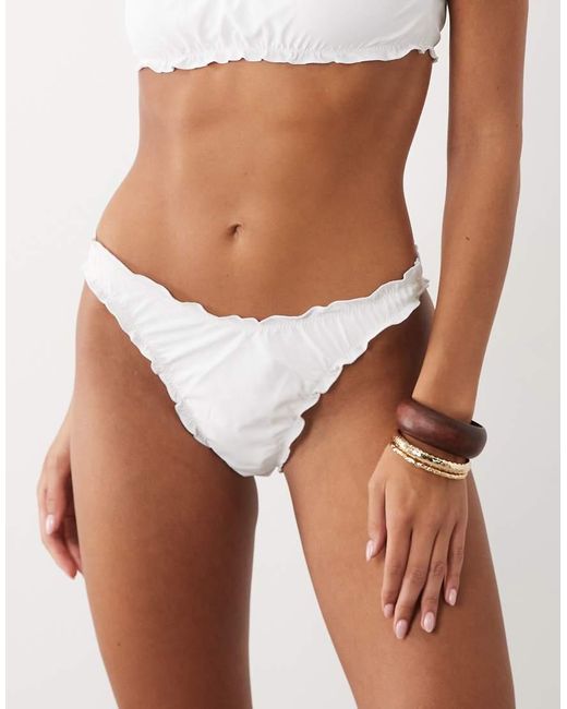 The Frolic White Exclusive Ruched Frill Bikini Bottoms Co-Ord