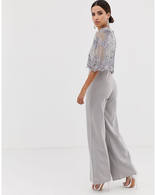 cape overlay jumpsuit