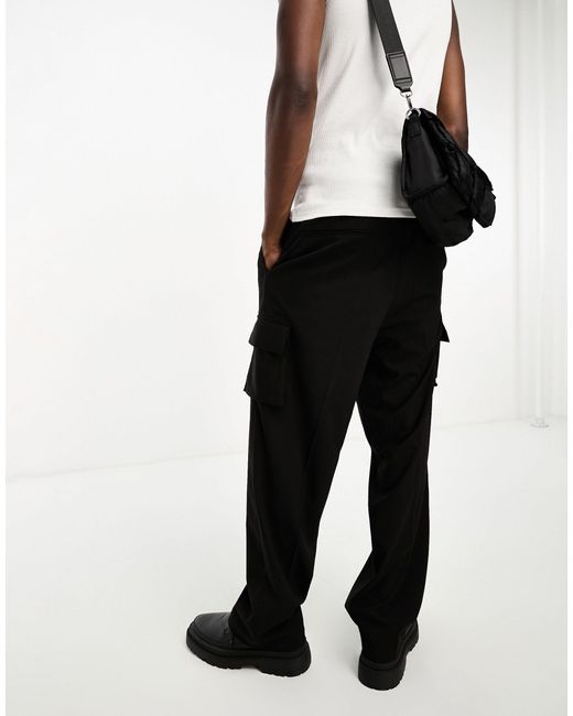 Pantalon ample d'ensemble à poches cargo ASOS pour homme en coloris Black