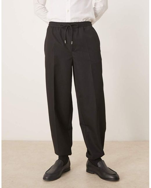 ASOS Black Tapered Fit Trouser With Elasticated Waist And Cuffs for men