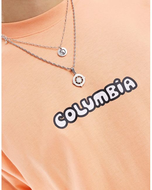 Exclusivité asos - - happiness ii - t-shirt avec imprimé au dos Columbia pour homme en coloris Orange