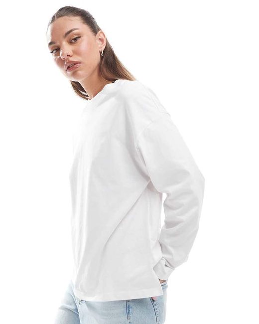 Camiseta Blanca De Manga Larga Con Cuello Redondo Y Estampado Gráfico "Wellness Club" De Cotton On Cotton On de color Blue