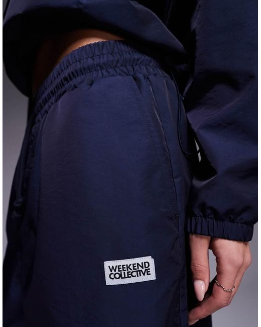 ASOS Blue Weekend Collective Barrel Leg Nylon Trackies